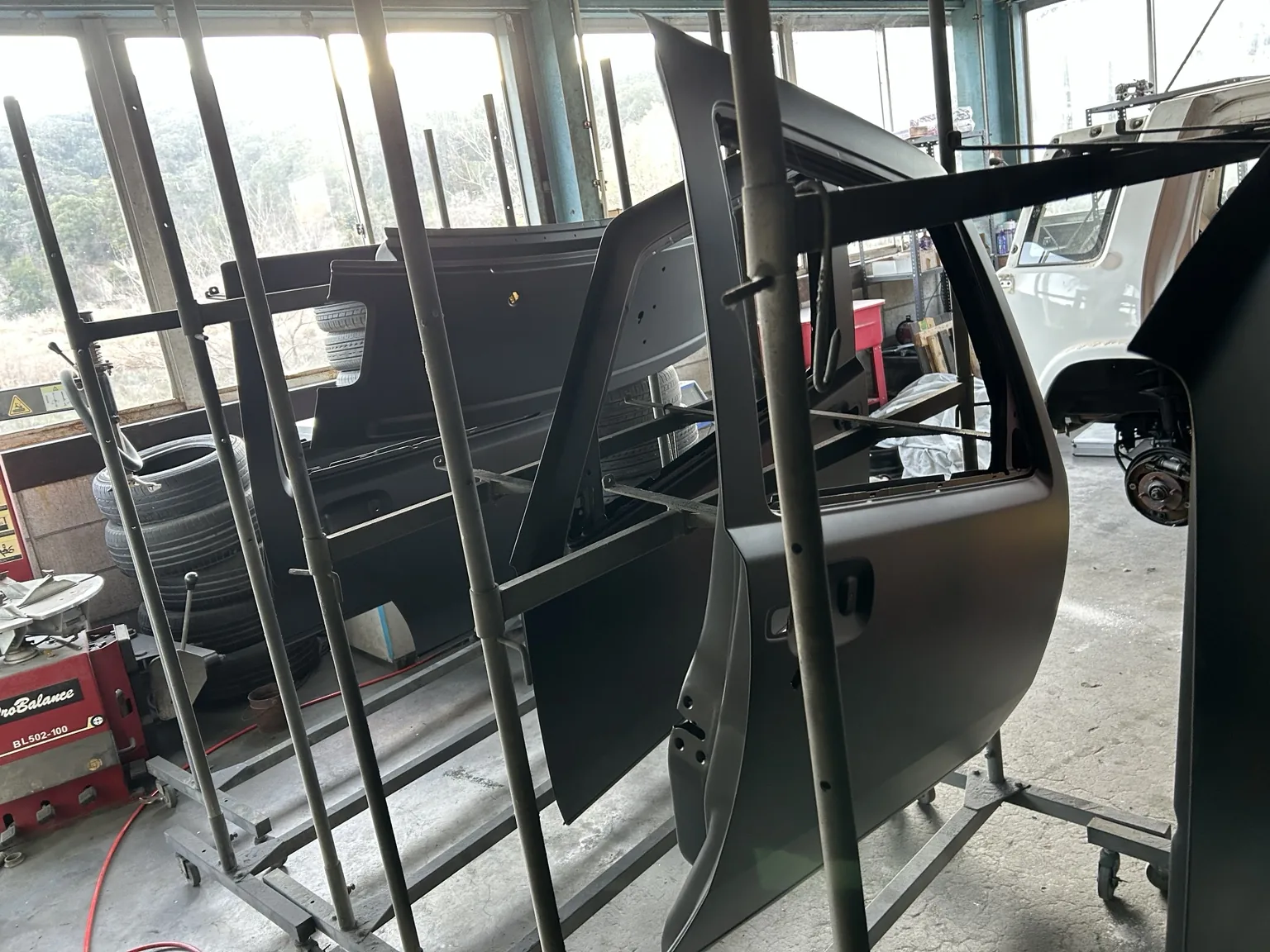 Nissan Rasheen body panels removed for paint work
