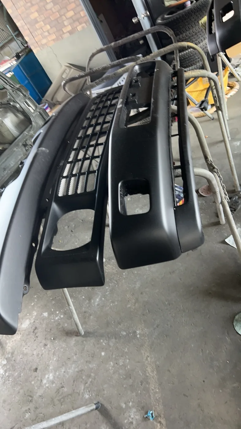 Rasheen front grille and bumper parts being refinished