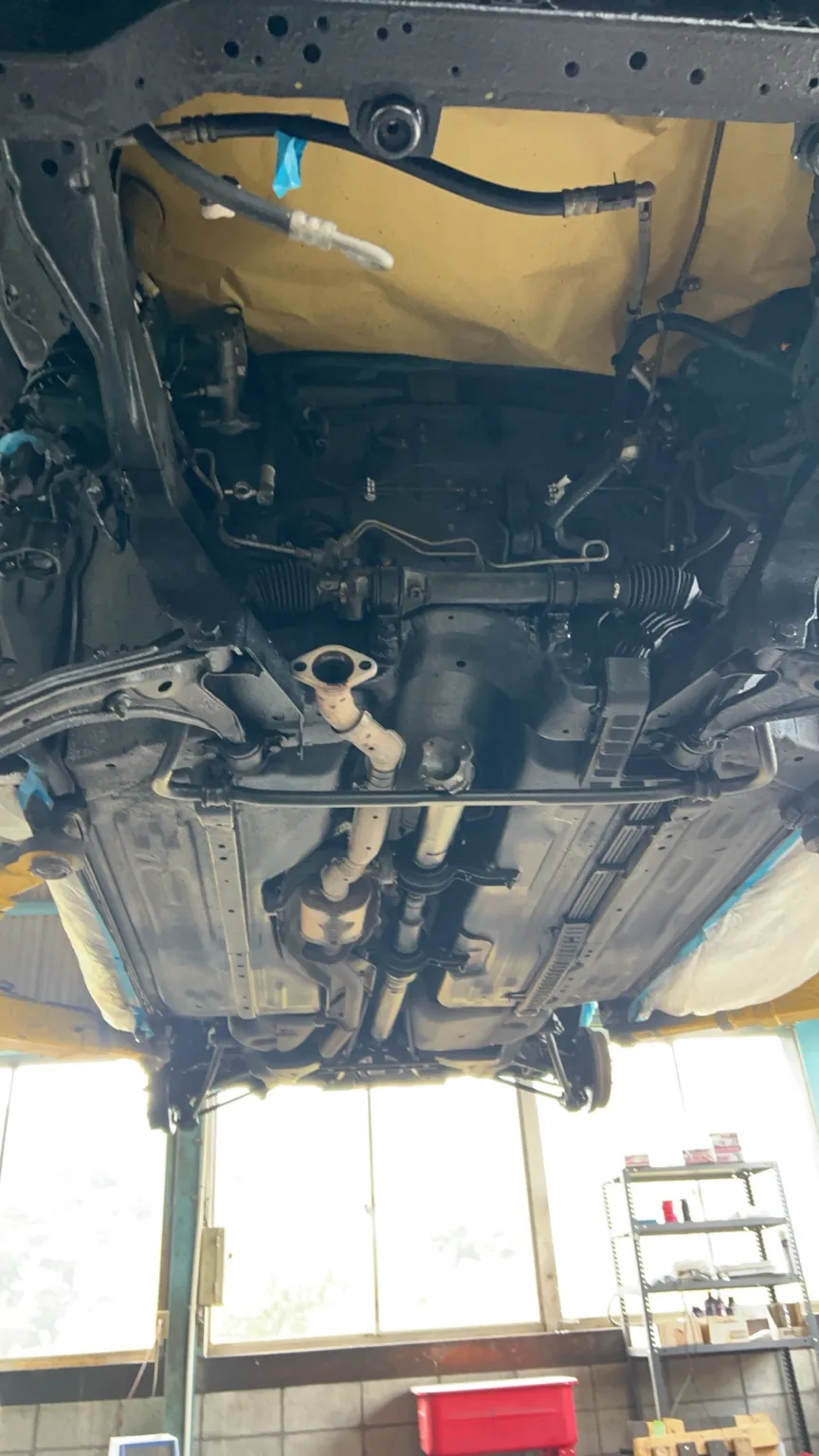 Nissan Rasheen underbody inspection on lift