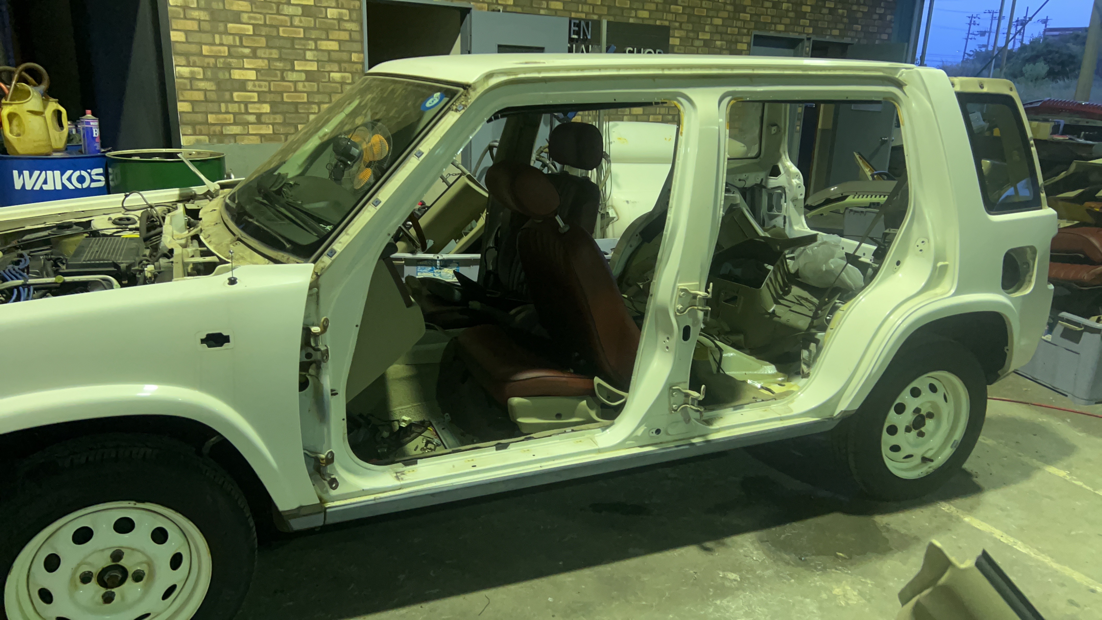 Disassembly in progress — stripping down the parts to kick off the restoration process