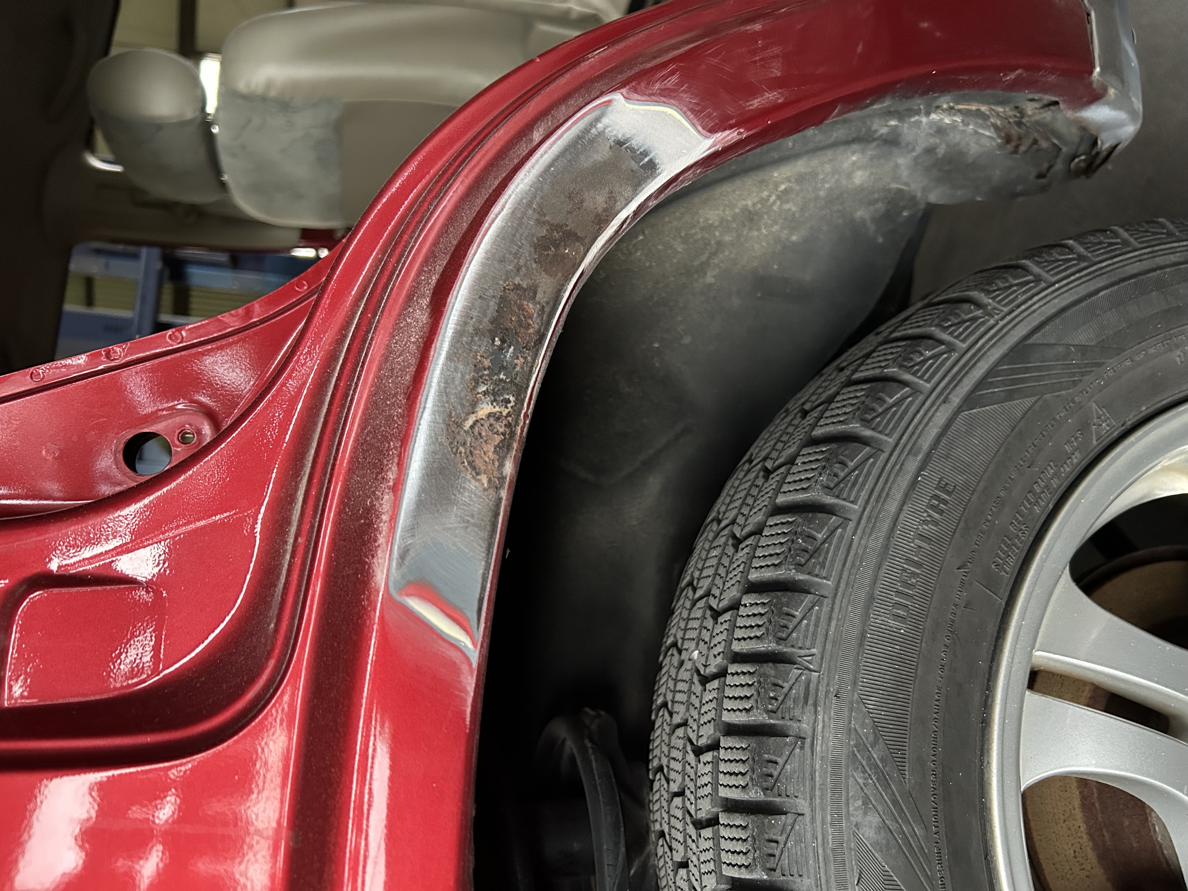 The wheel arch after the outer surface was removed for inspection.