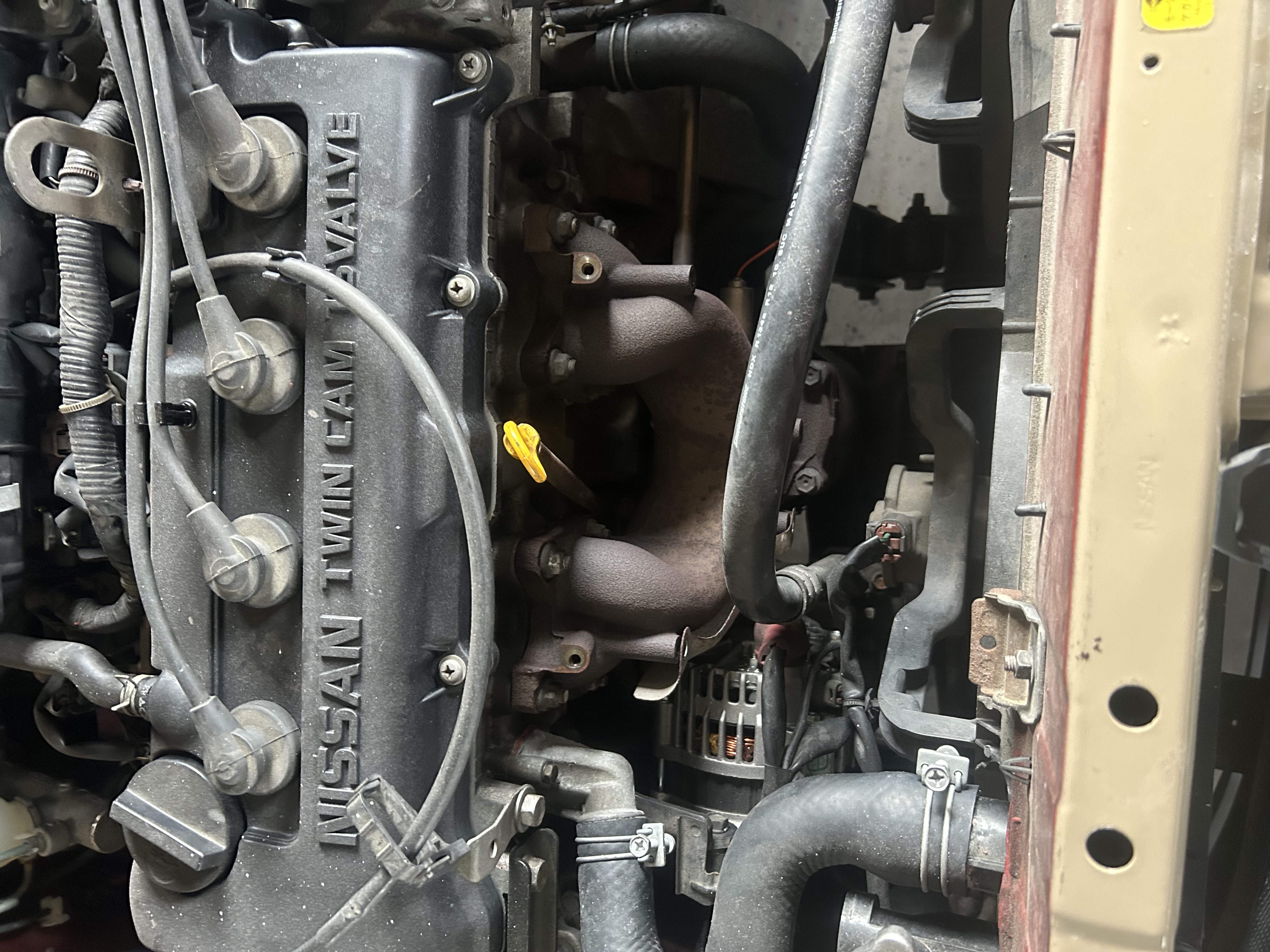 Factory exhaust manifold before removal