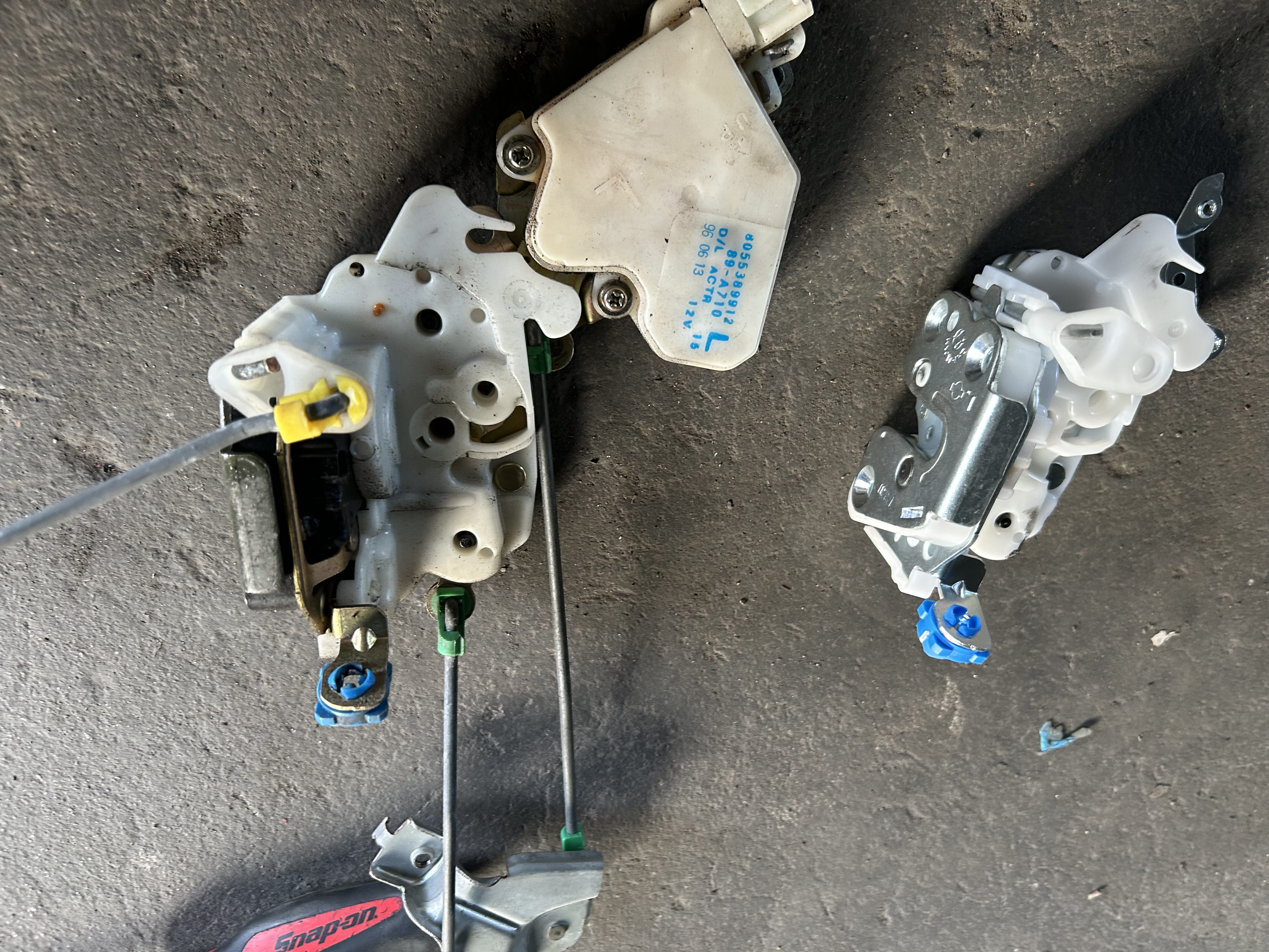 Comparison of the old and replacement door lock assemblies