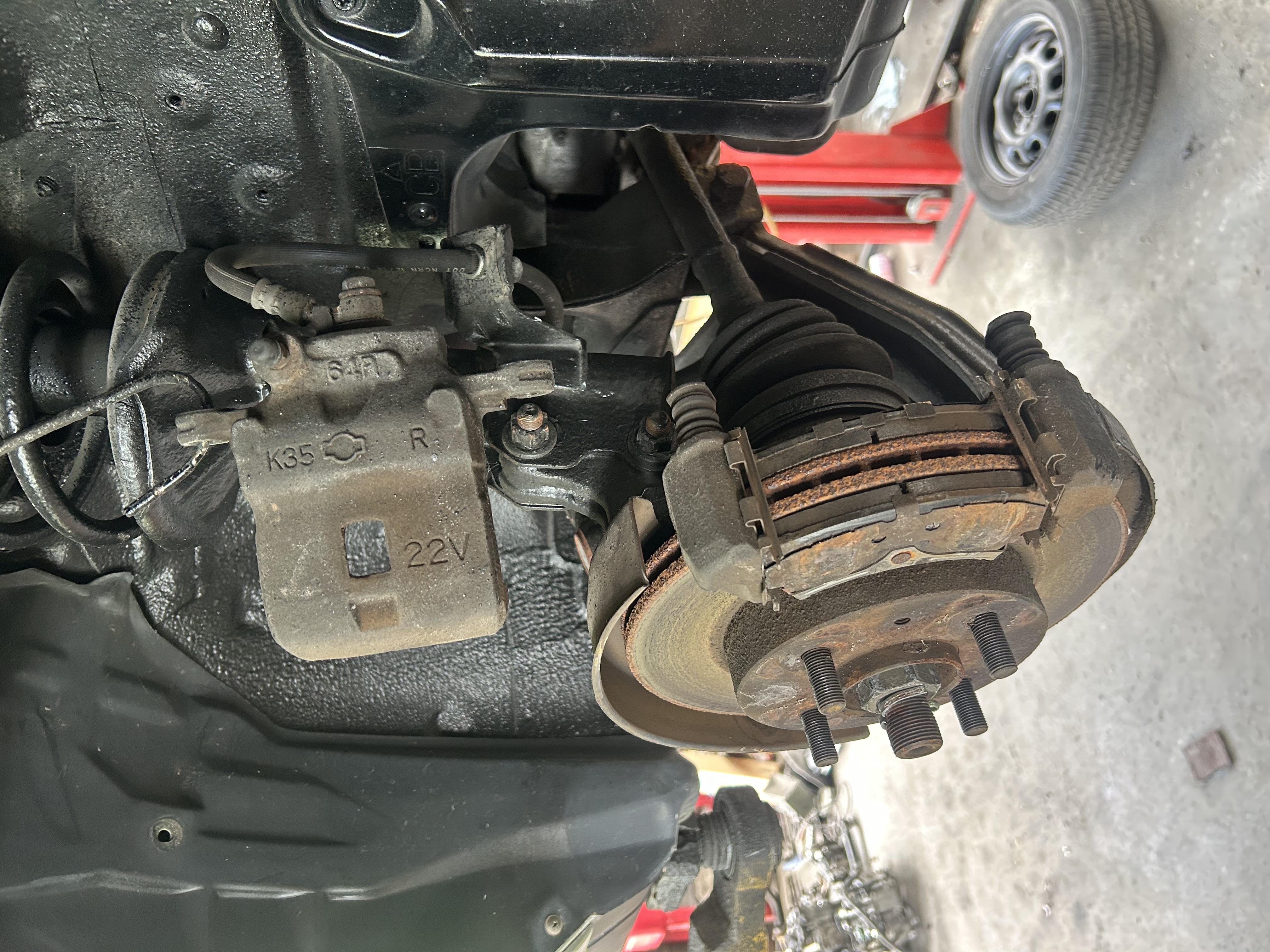 Front suspension and brake assembly before disassembly