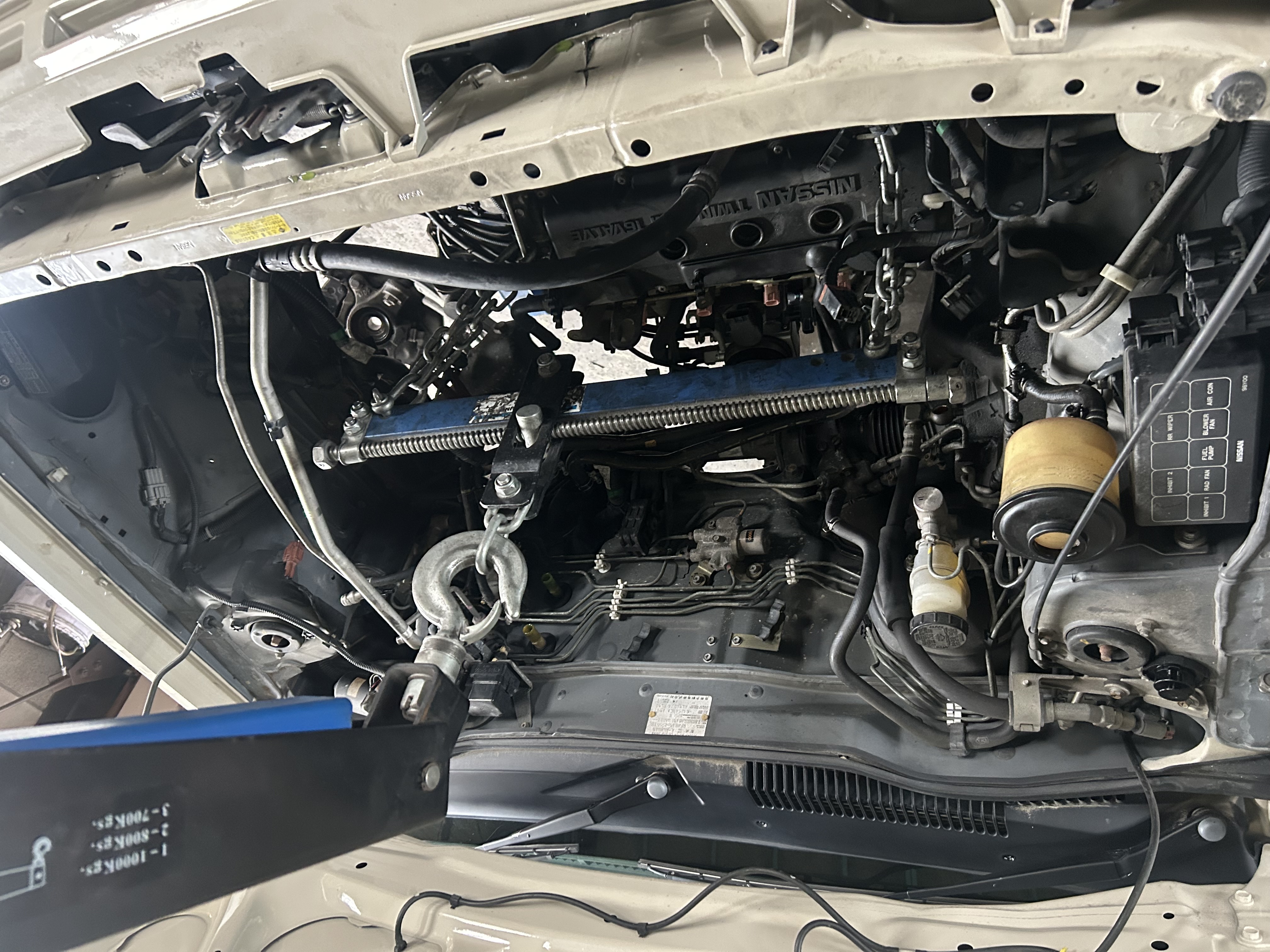 Powertrain extraction in progress.