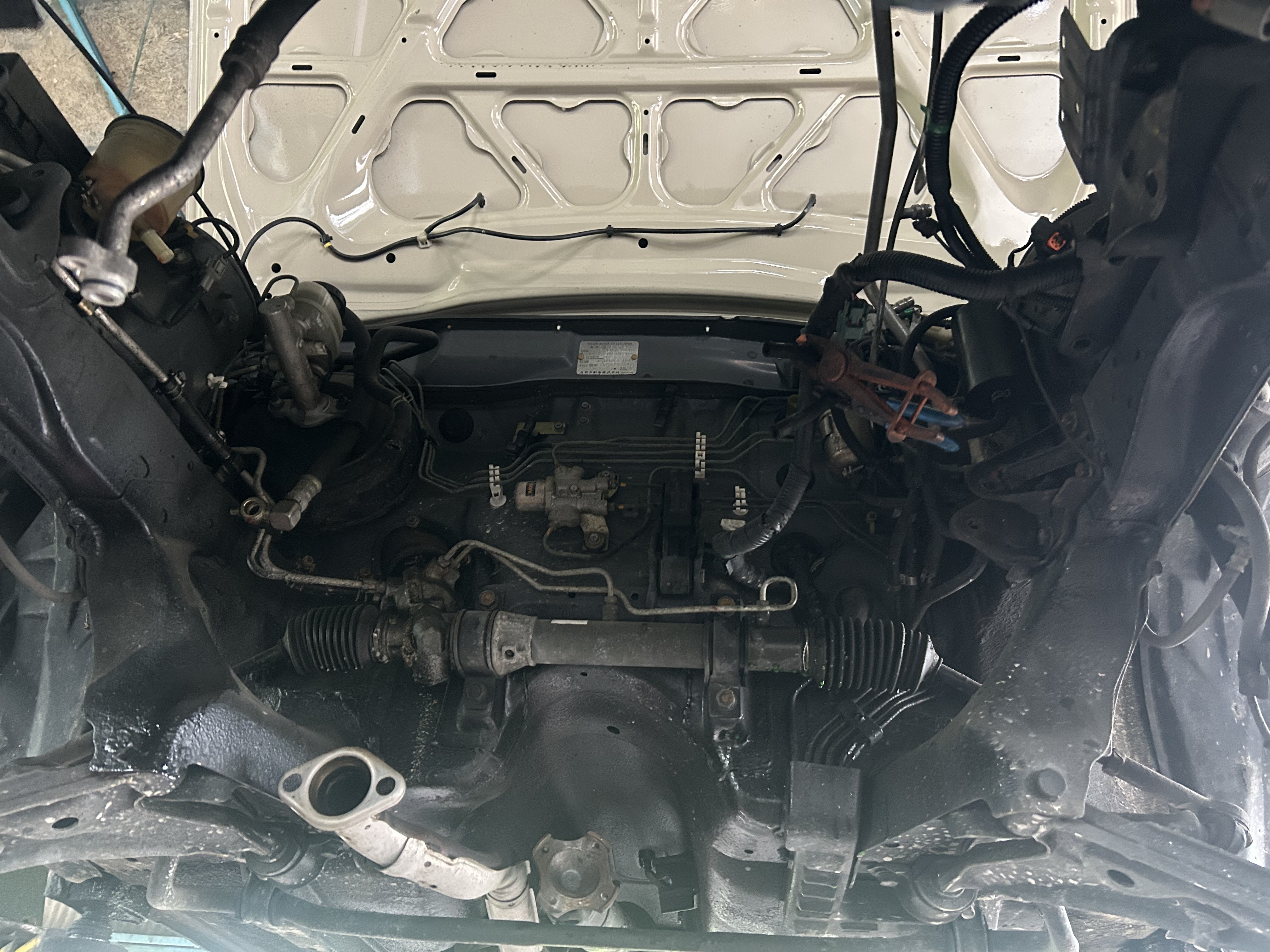 Underside view of powertrain removal.