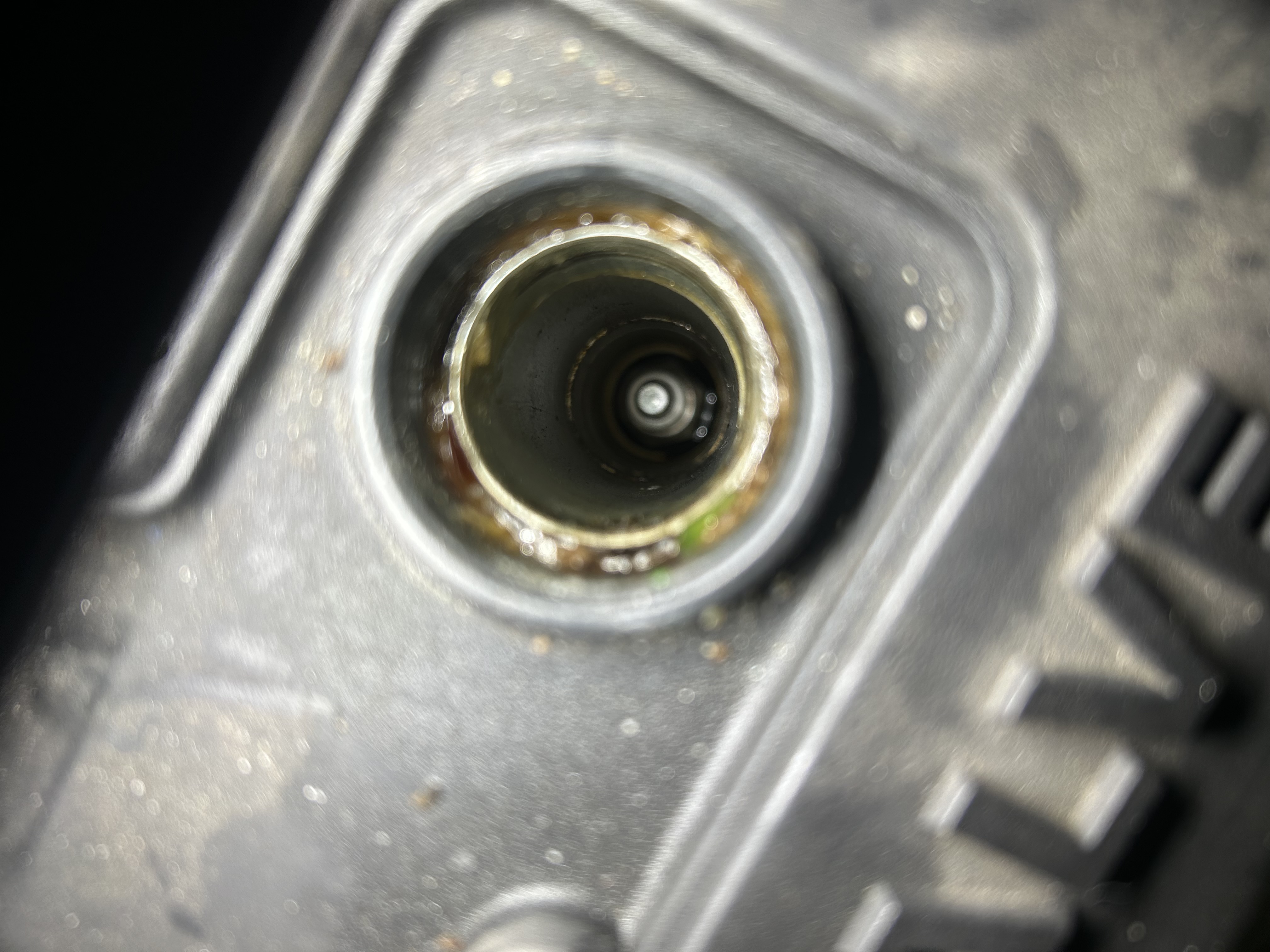 Oil-soaked spark plug boot.