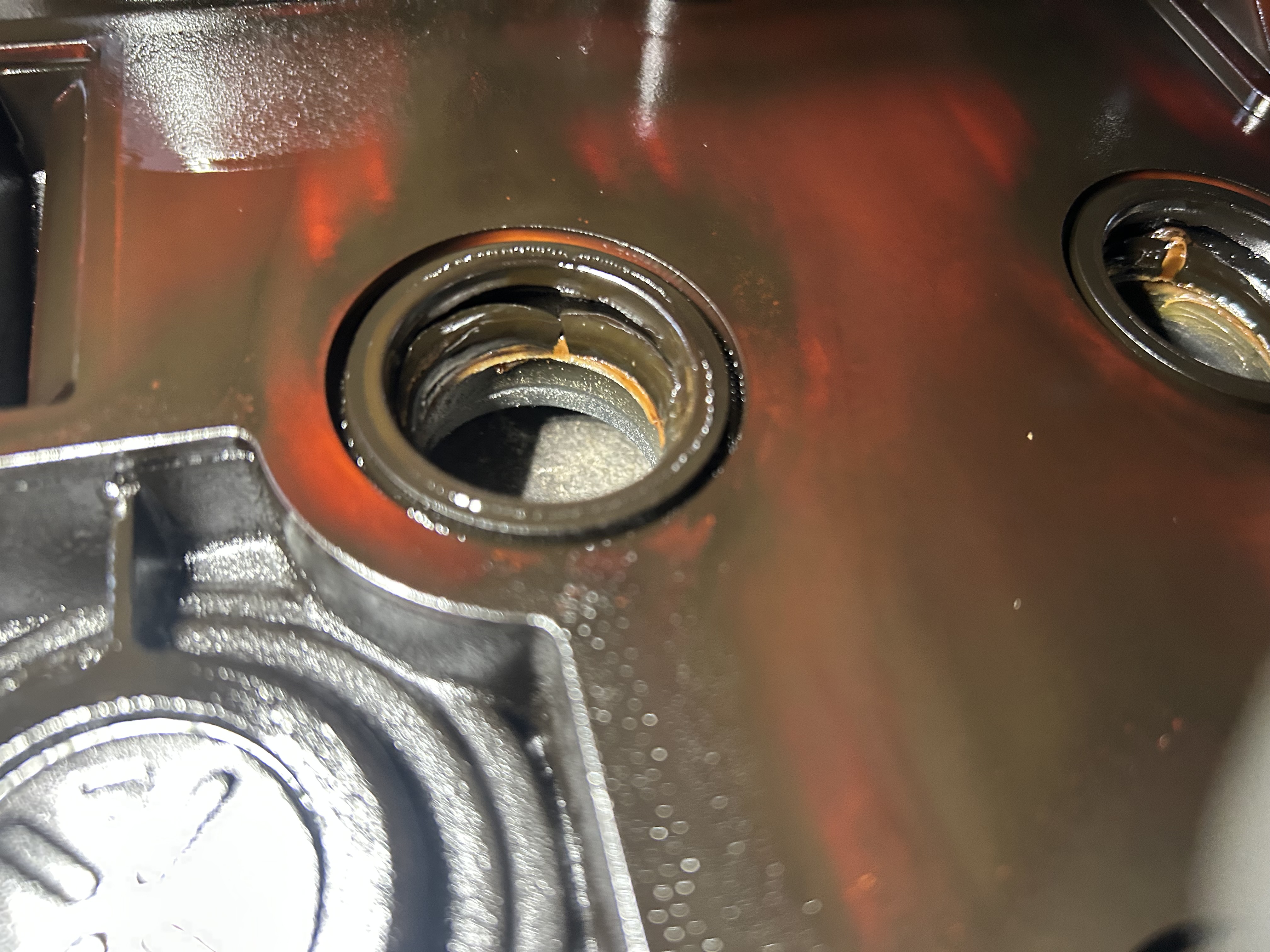 Nissan Rasheen Oil Leak Around the Spark Plug Wells: A Common Valve Cover Problem
