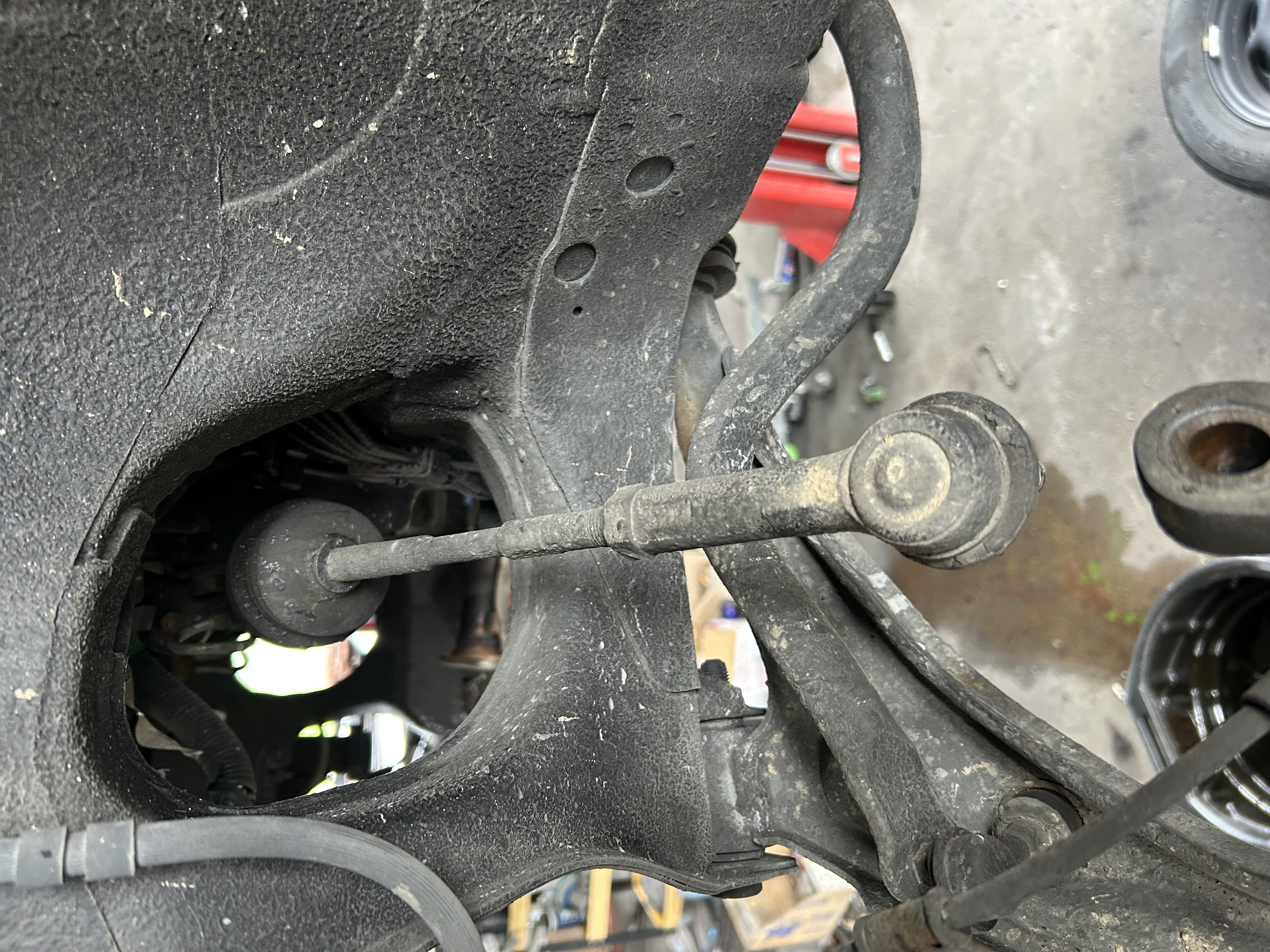 Disconnecting the steering linkage.