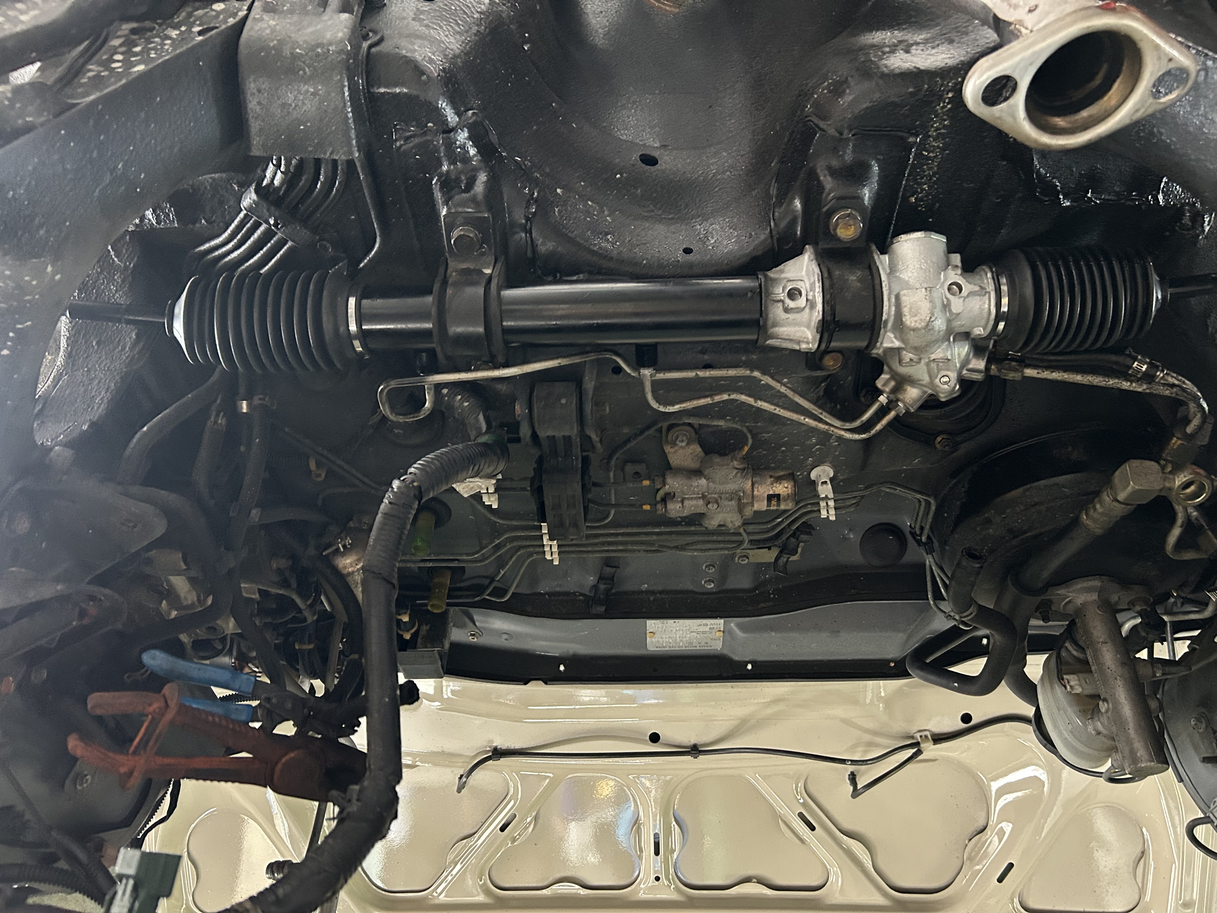 The rebuilt power steering rack installed on the Nissan Rasheen.