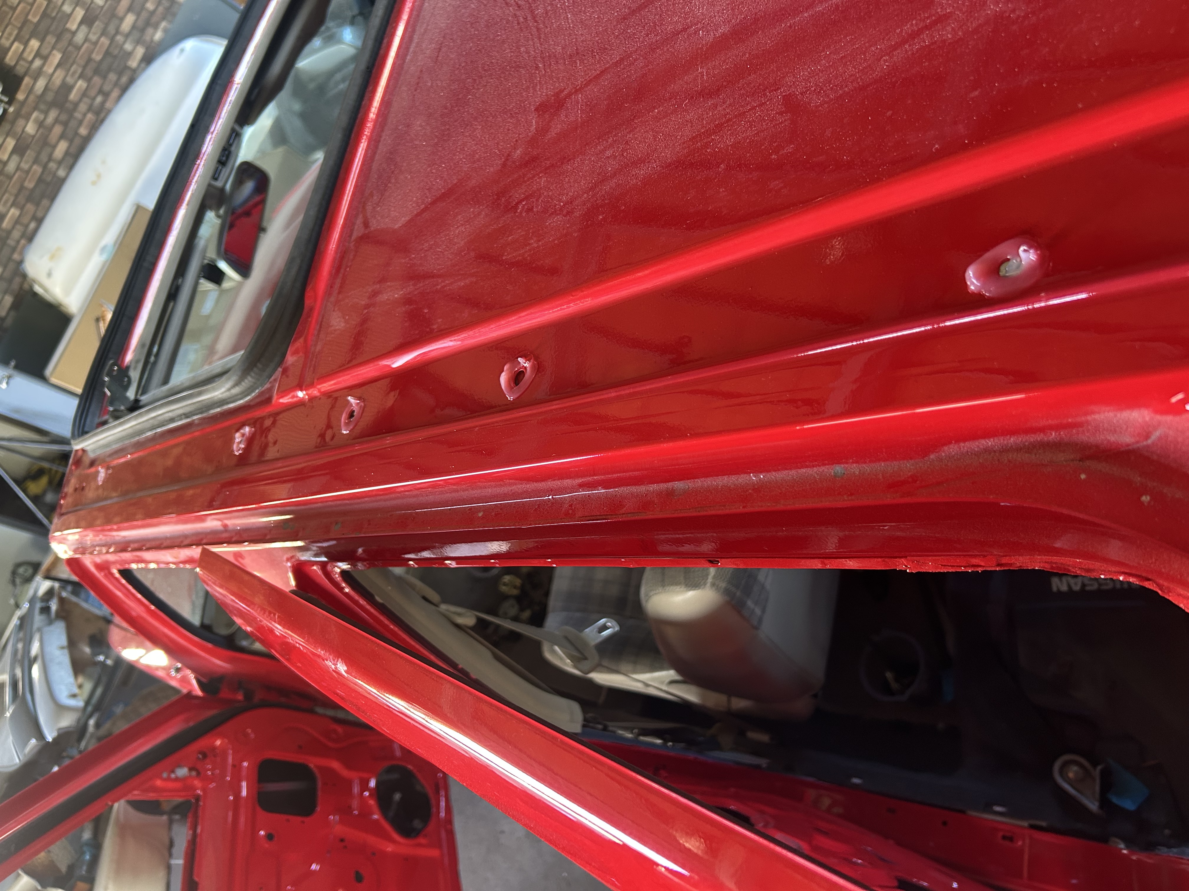 Painted upper door opening and roof channel