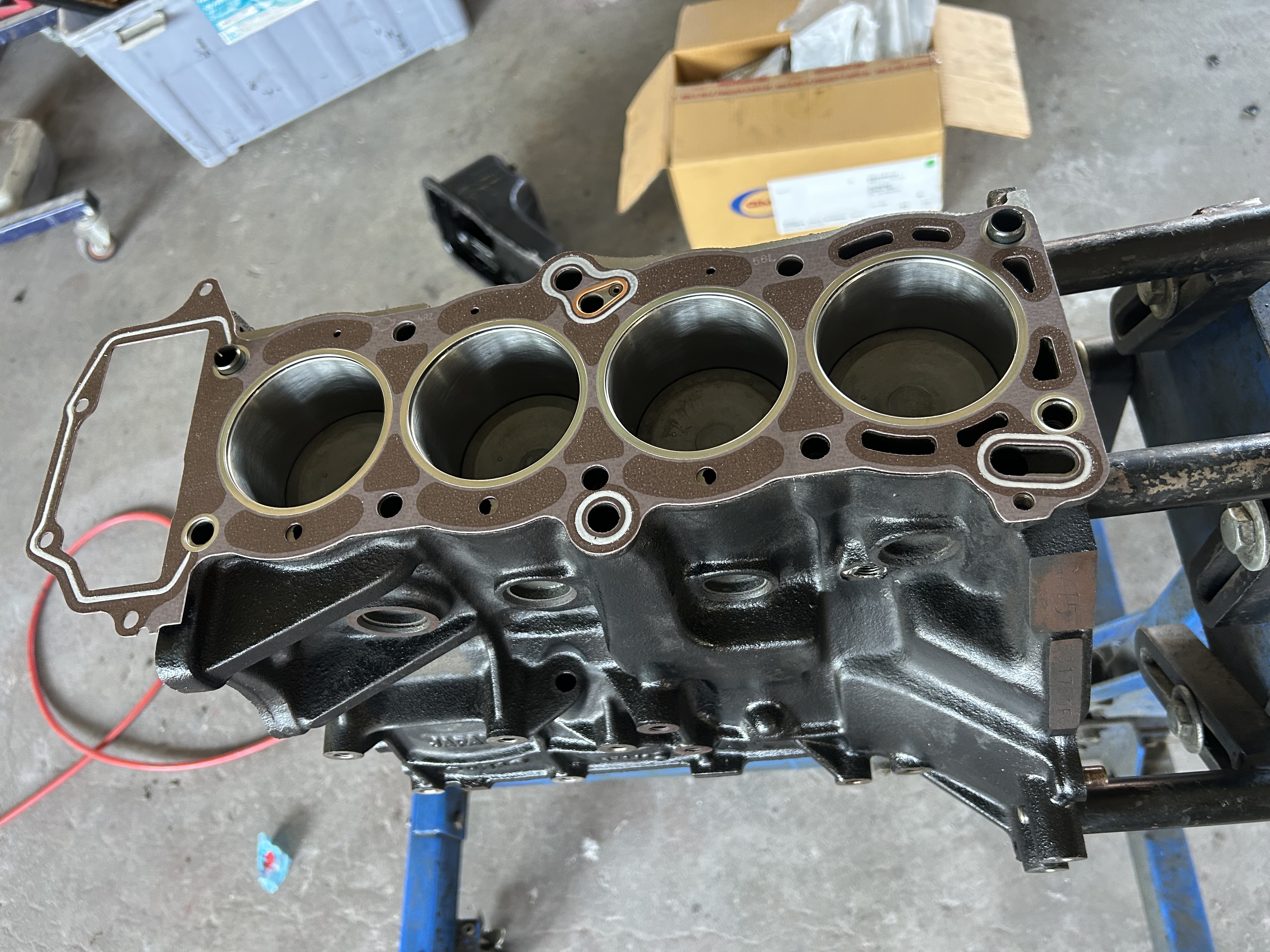 The head gasket positioned on the prepared block before the cylinder head was installed.
