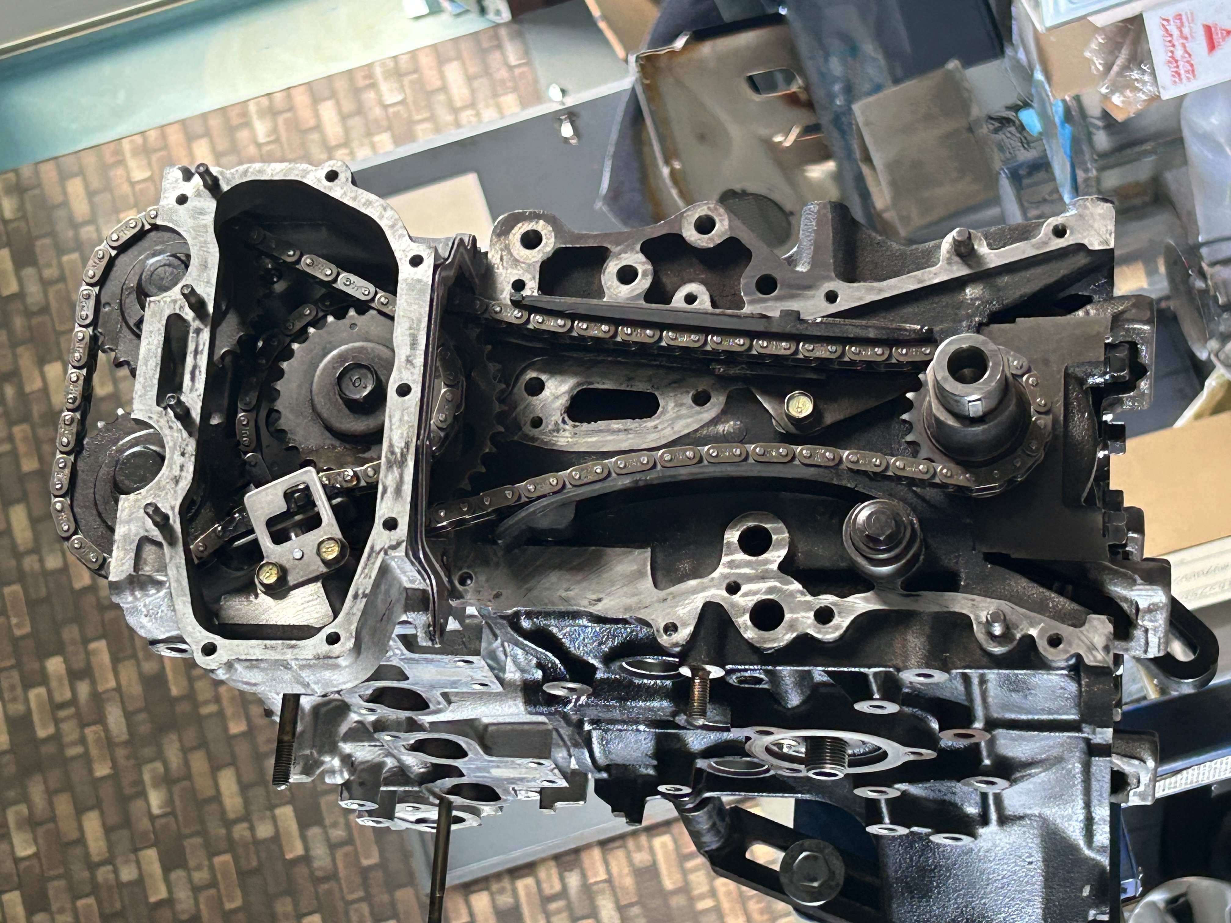 The timing chain, sprockets and guides assembled before the front cover was installed.