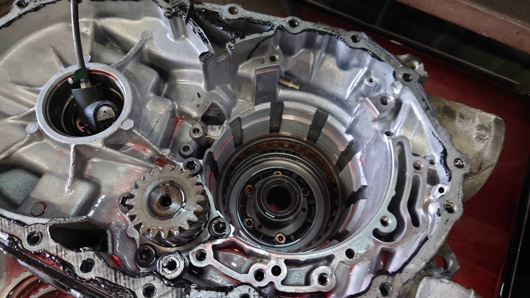 The gears, shafts and bearing surfaces are inspected for abnormal wear or damage.